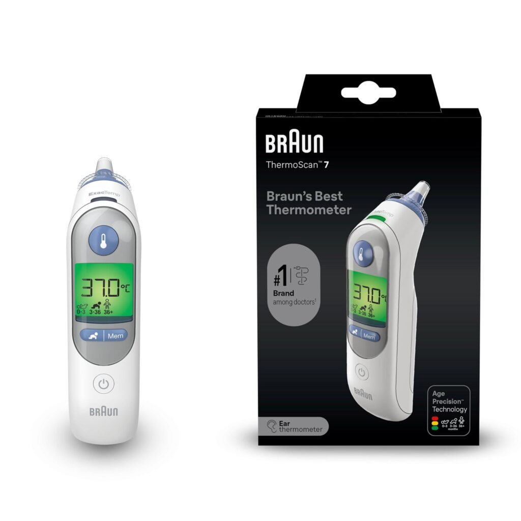 Braun ThermoScan 7 ear thermometer on a bathroom counter with a kid-friendly display