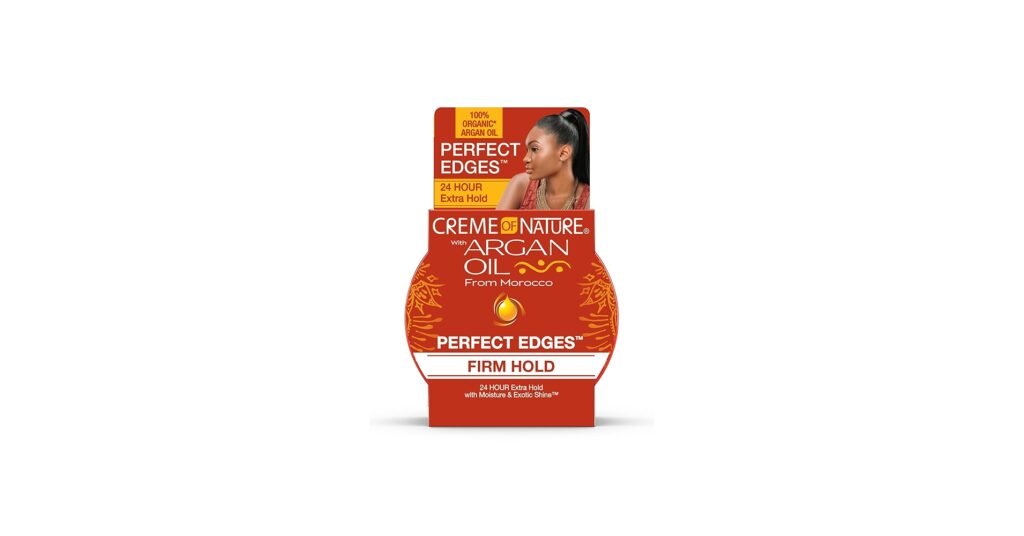 Creme of Nature Argan Oil Perfect Edges jar with smooth gel texture on a fingertip