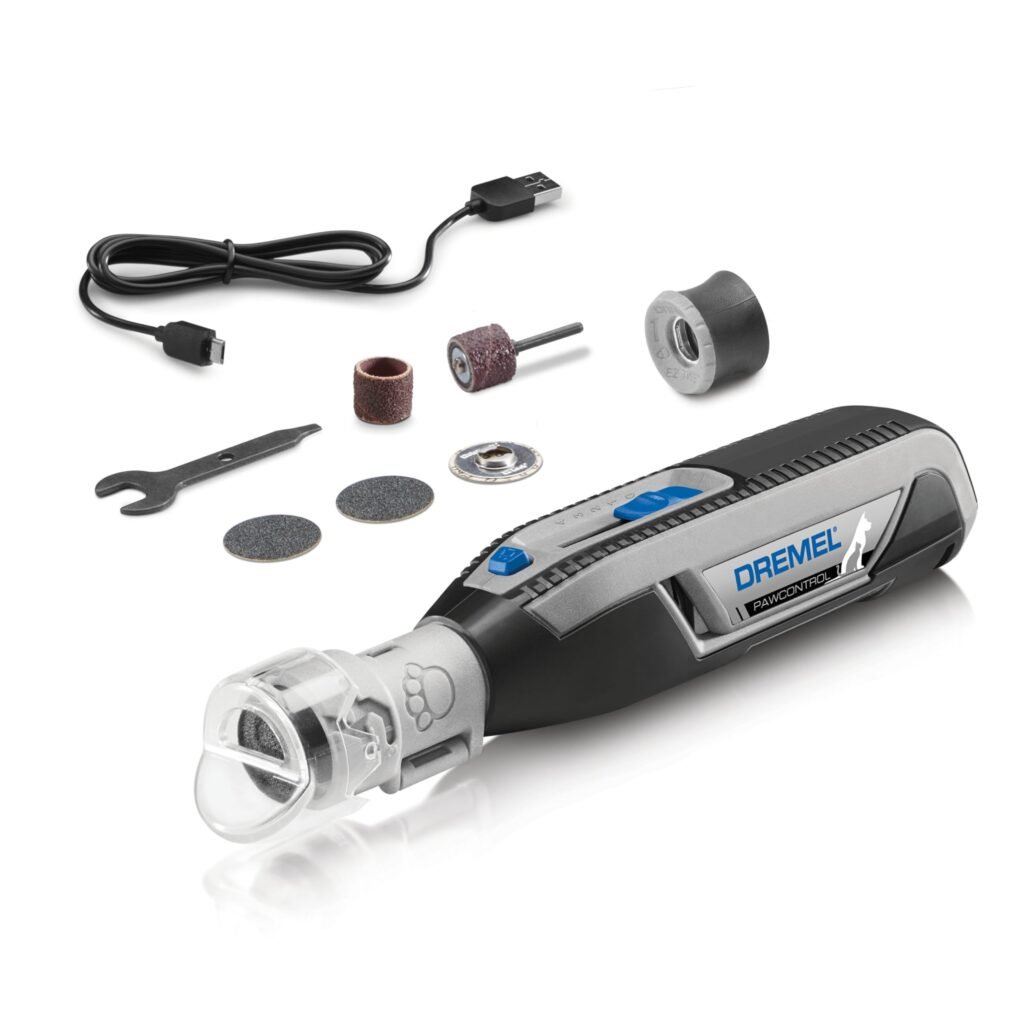 Dremel PawControl dog nail grinder kit with attachments on a tabletop