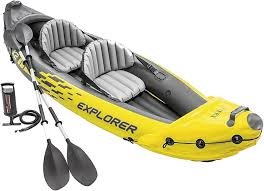 Intex Explorer K2 inflatable two person kayak on calm lake water with two seats and bright yellow hull