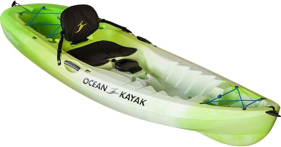 Ocean Kayak Malibu 9.5 sit on top kayak on shoreline with wide deck and molded seat area