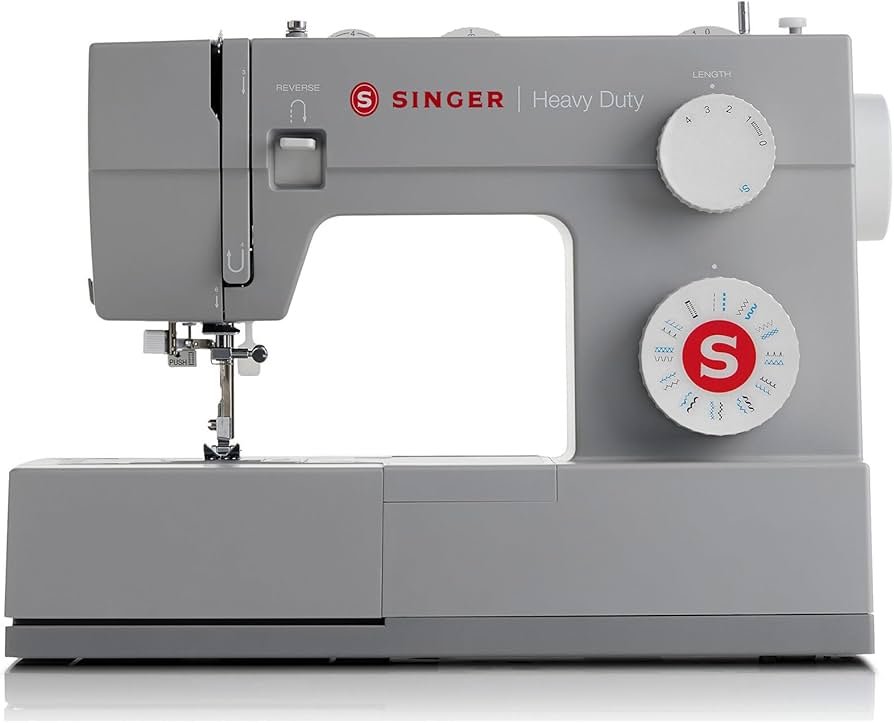 Singer 4423 Heavy Duty sewing machine on a table with metal frame and stitch dial
