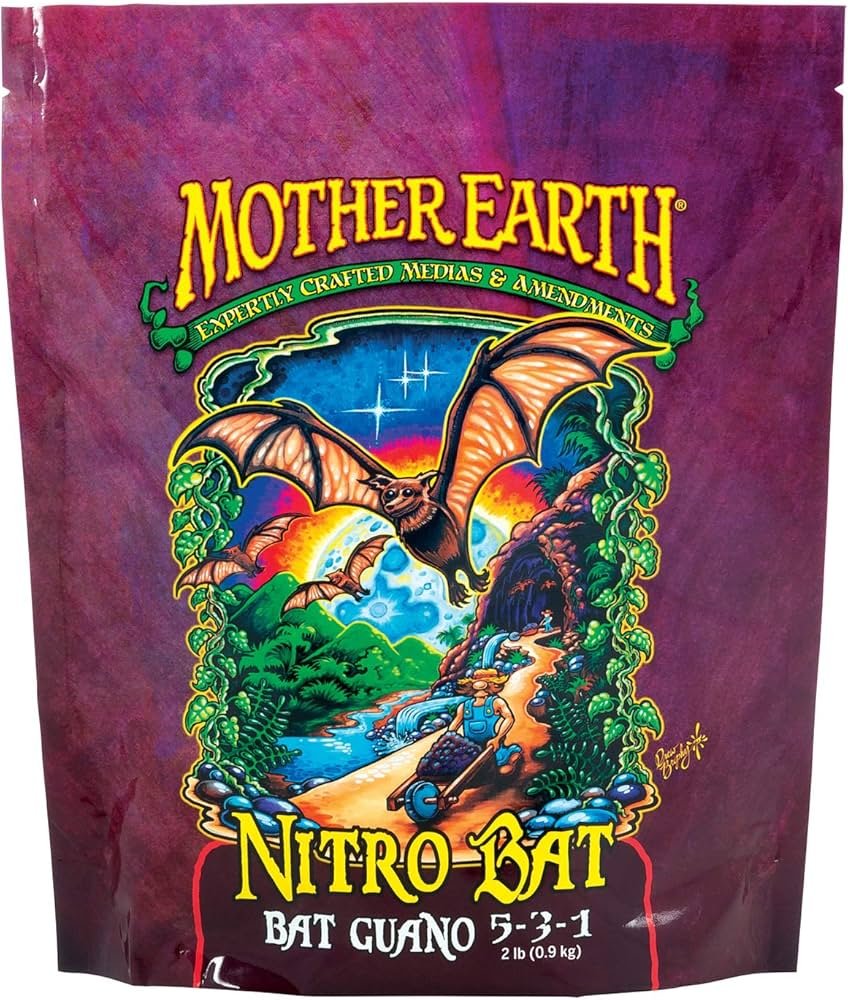 Mother Earth Nitro Bat Guano fertilizer bag next to a raised bed with young tomato plants