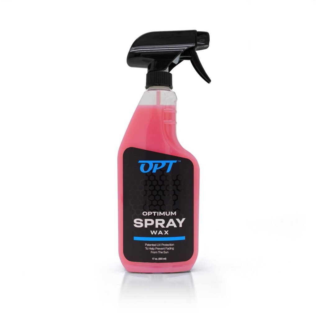 Optimum Car Wax spray bottle applied to glossy black car hood