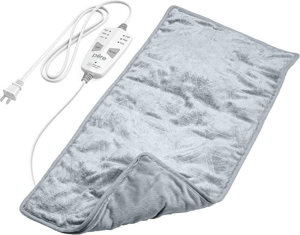 Pure Enrichment weighted heating pad with massage placed across abdomen
