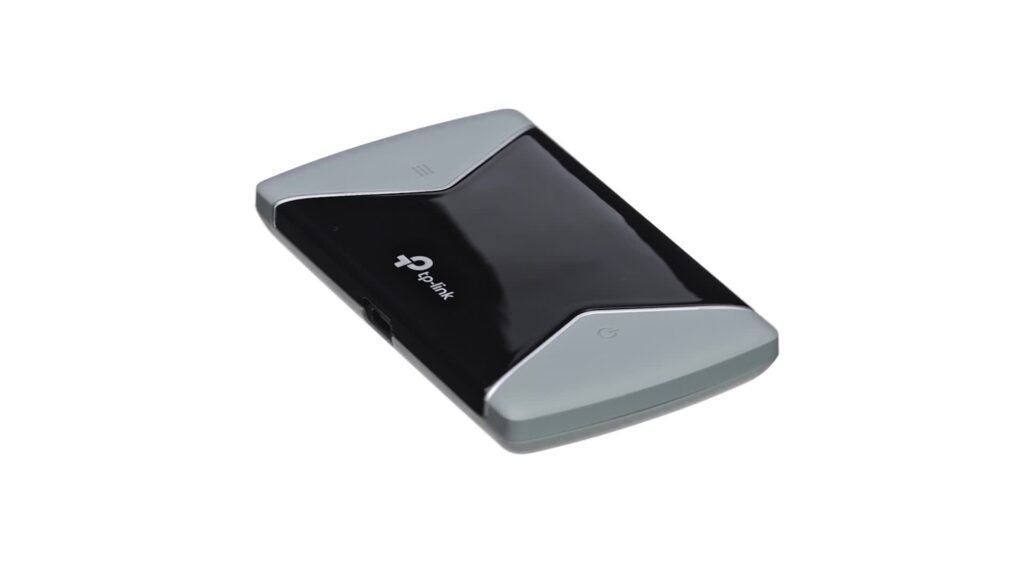 TP-Link M7650 compact 4G LTE mobile hotspot device on travel desk