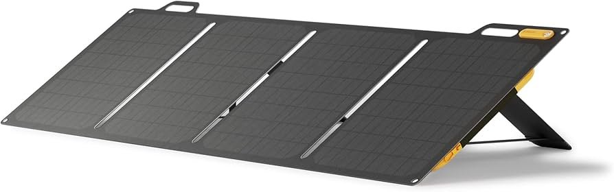 BioLite SolarPanel 100 foldable 100W panel on a campsite, charging devices through USB-C and USB-A