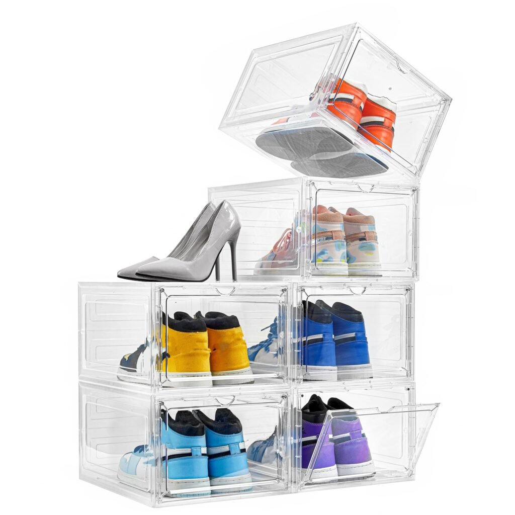 Clear plastic shoe bin with stacked lids holding sneakers and flats