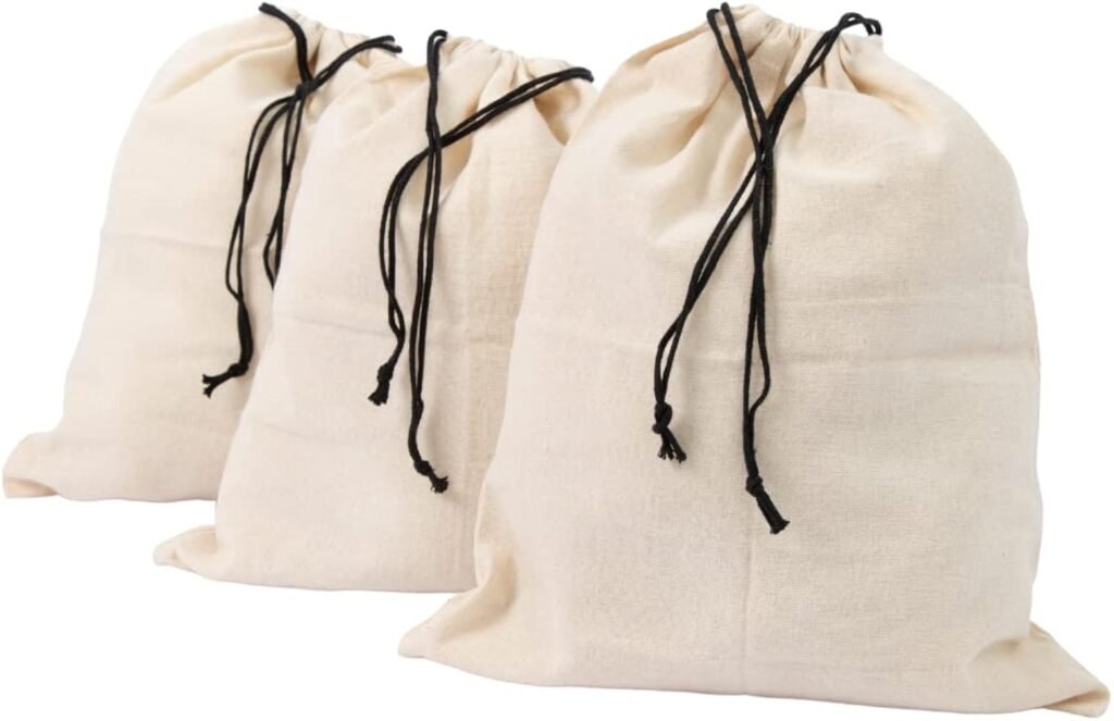 Cloth shoe dust bags with drawstrings holding dress shoes and heels
