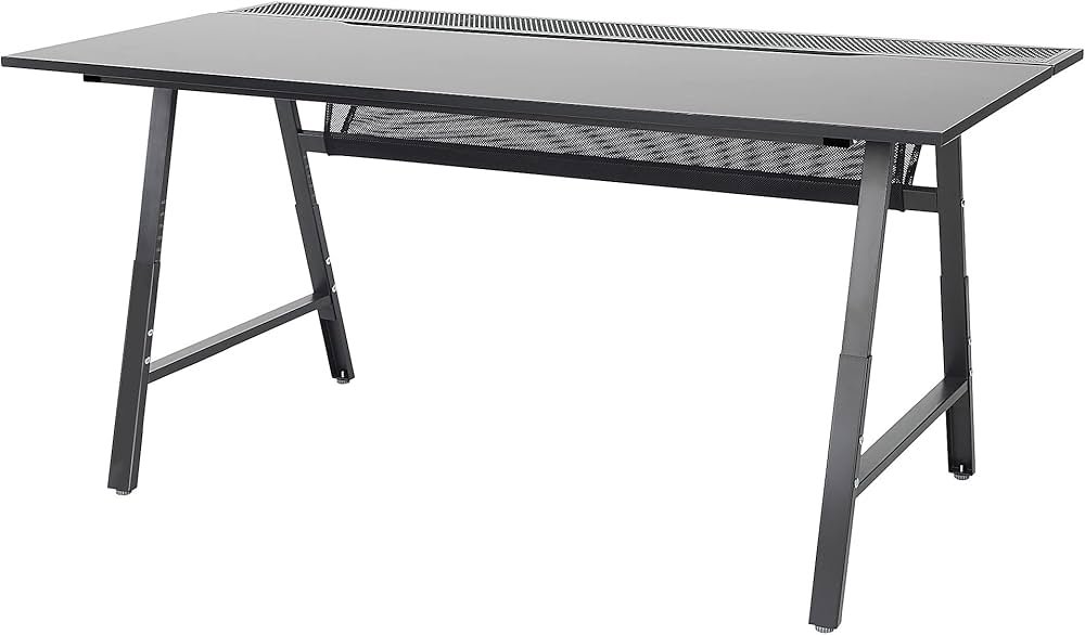 Wide IKEA UTESPELARE gaming desk with a black tabletop, metal mesh back, and a dual monitor setup