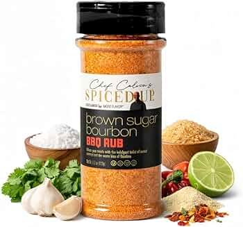 Brown sugar steak rub in a small bowl beside raw flank steak ready for grilling