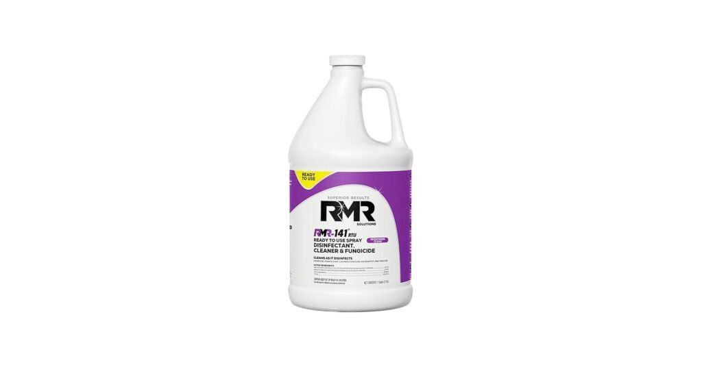 RMR-141 mold remover spray bottle applied to bathroom wall mold