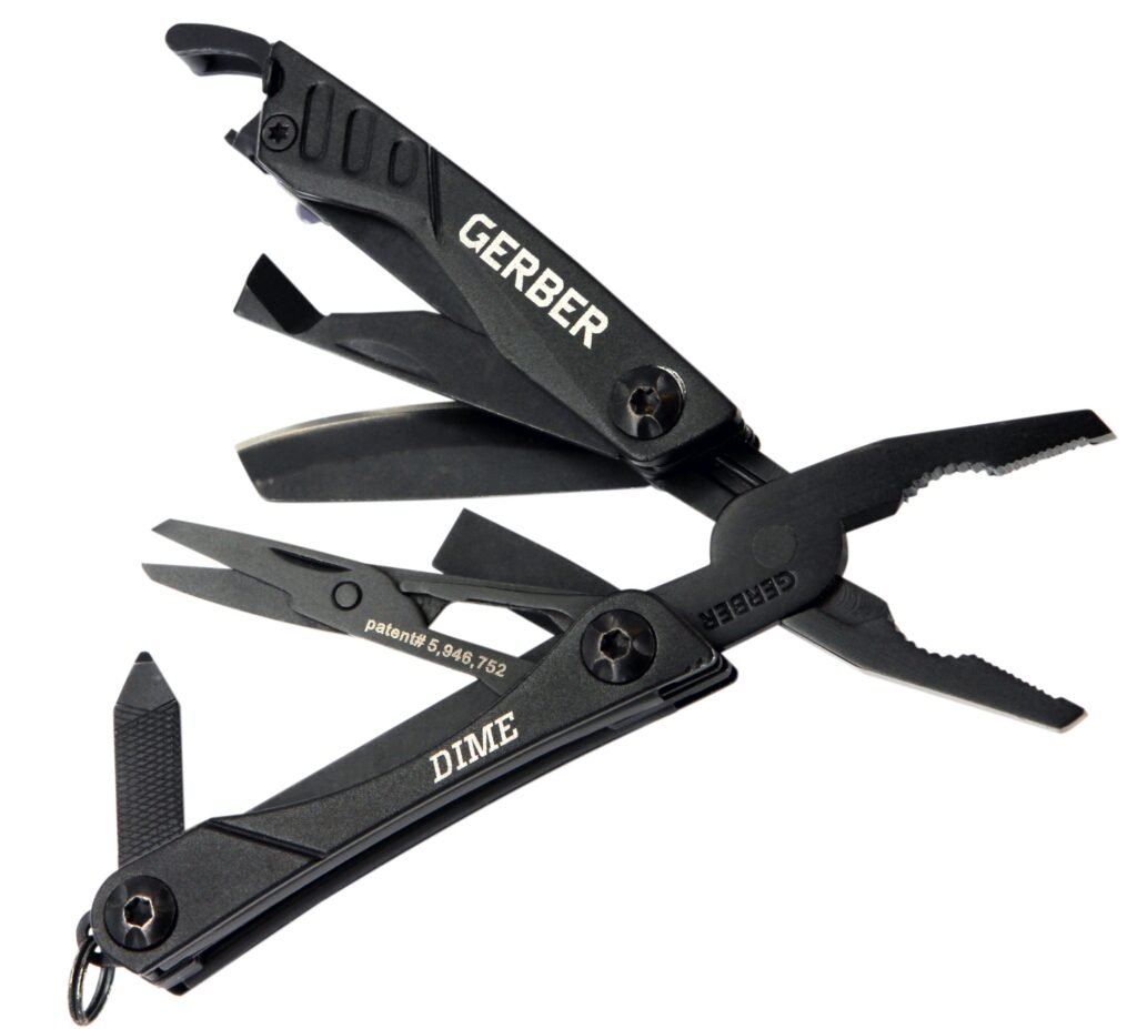 Gerber Dime compact multi-tool open with mini pliers and small blade on a keychain