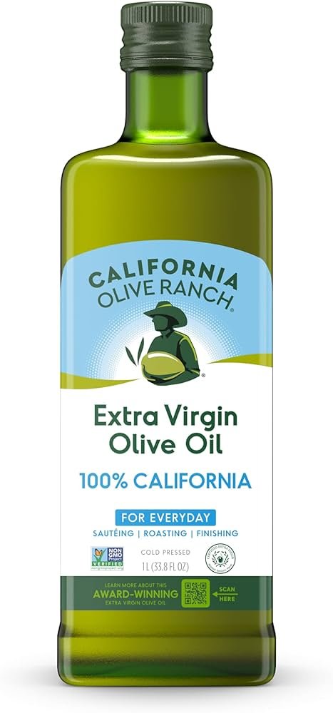 California Olive Ranch extra virgin olive oil bottle on a kitchen counter, shown as a daily “best olive oil for health” pick.