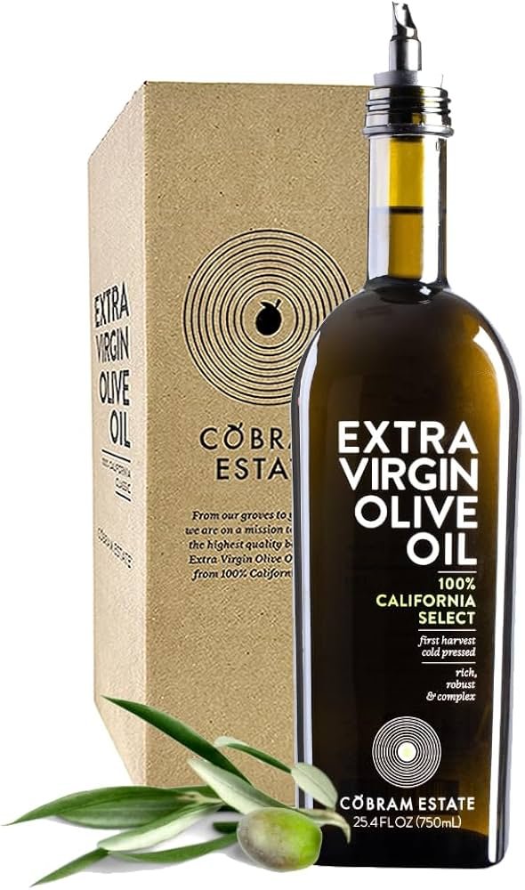 Cobram Estate extra virgin olive oil bottle beside a salad bowl, shown as a fresh “best olive oil for health” choice.