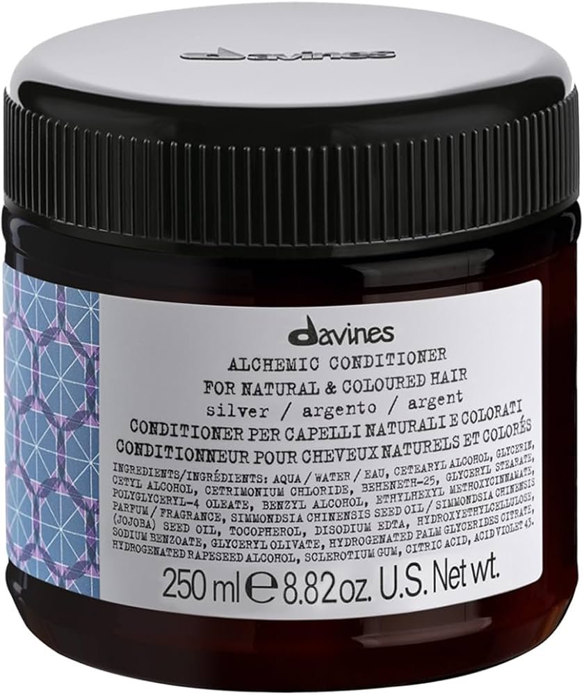 Davines Alchemic Silver conditioner is used to keep gray-blonde hair cool and reduce yellow warmth.
