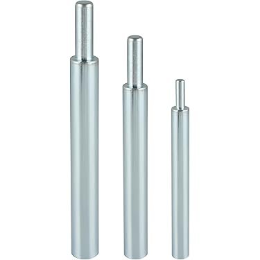 Drop-in anchor set flush in a drilled cinder block hole, ready for a bolt or threaded rod installation.