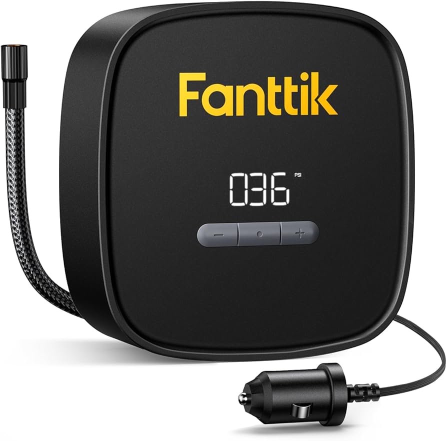 Fanttik X9 SE 12V portable air pump for car tires plugged into a vehicle outlet, with pressure gauge display.