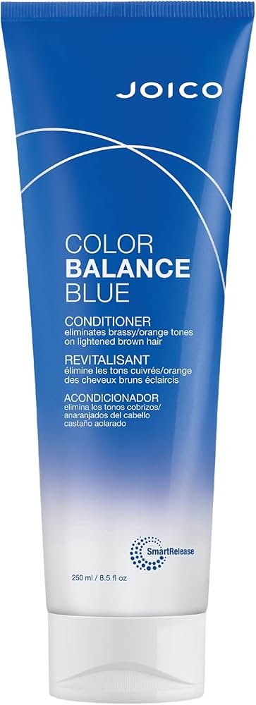 Joico Color Balance Blue conditioner is used after shampoo to tone orange brassiness in brassy blonde hair.