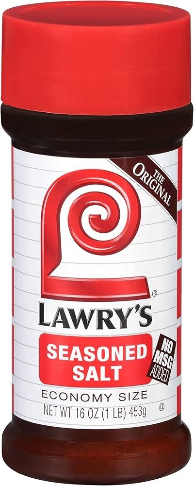 Lawry’s Seasoned Salt shaker near golden fries, shown as a classic seasoning for fries.