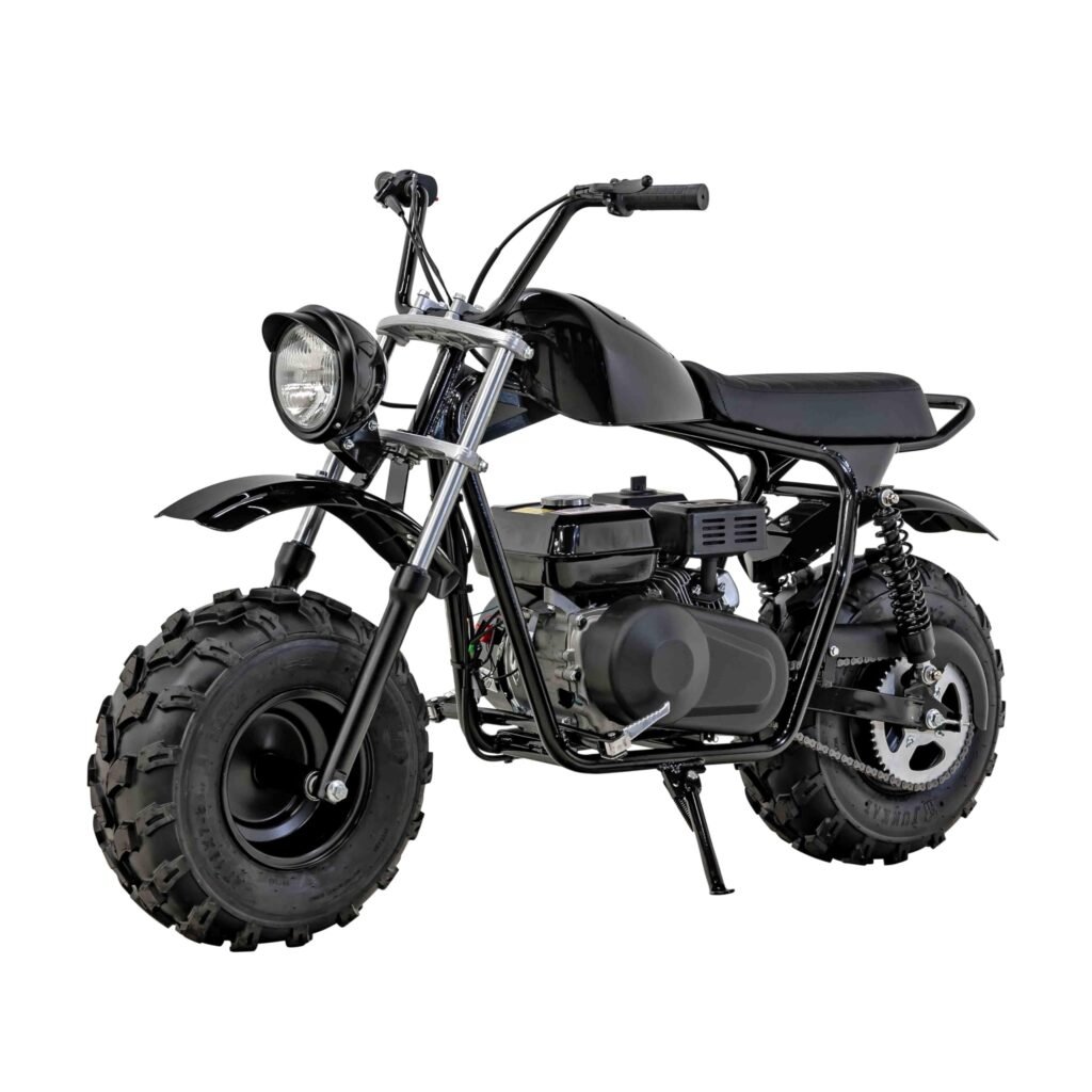Massimo MB200S mini bike for adults with large knobby tires and a rugged frame on a dirt trail.