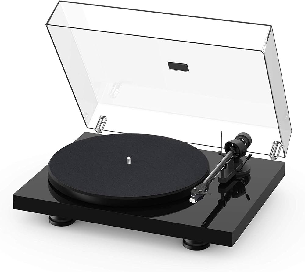 Pro-Ject Debut Carbon EVO record player with a minimalist design and a vinyl record playing, presented as a step-up beginner option.