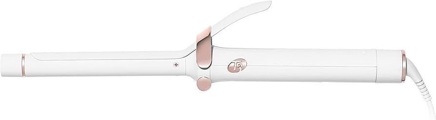 T3 SinglePass Curl 0.75-inch curling iron shaping short hair into soft waves, ideal for a polished 2026 short-hair look.