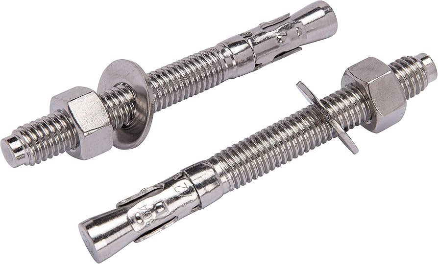 Wedge anchor tightened into a solid masonry section with washer and nut for a heavy-duty cinder block mount.