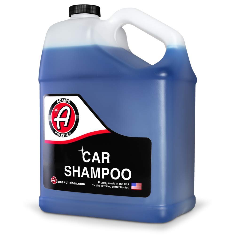 Adam’s car wash shampoo bottle with thick foam in a bucket for a slick, beginner-friendly wash routine.