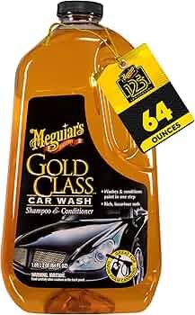 Meguiar’s Gold Class car wash soap bottle shown with a microfiber mitt for a glossy rinse-clean finish.