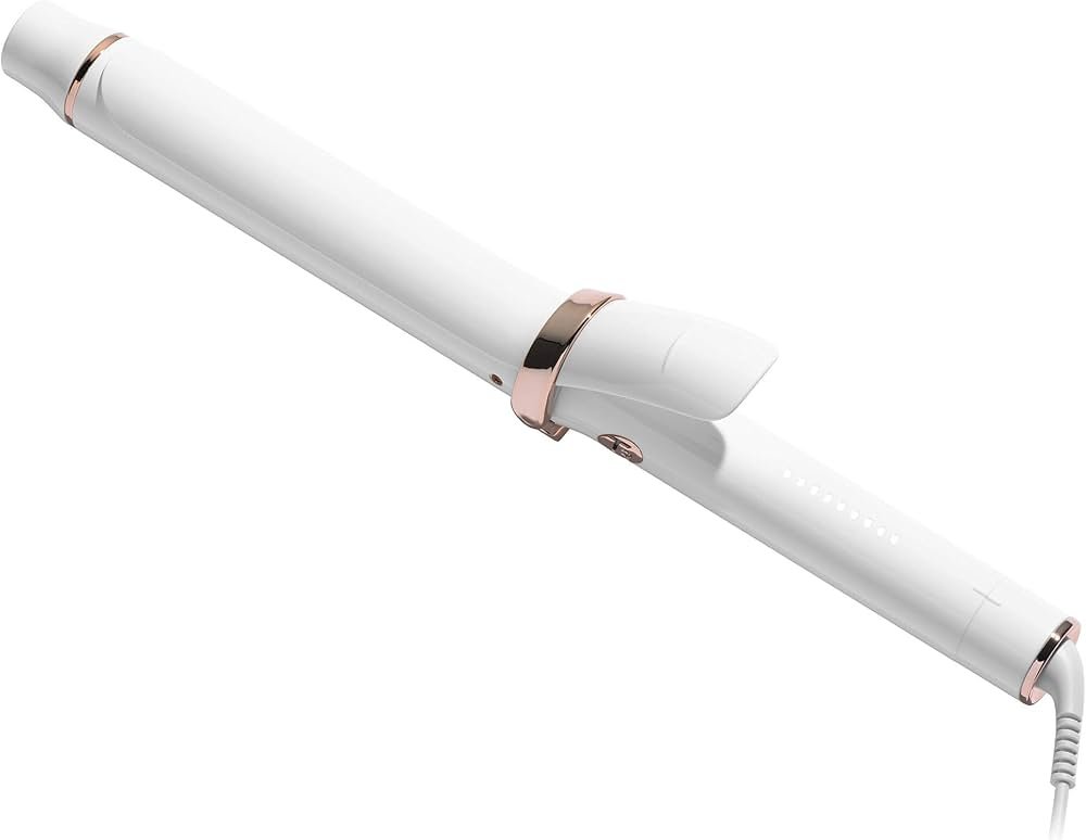 Extra-long barrel curling iron on long hair, creating smooth curls that hold through the day.